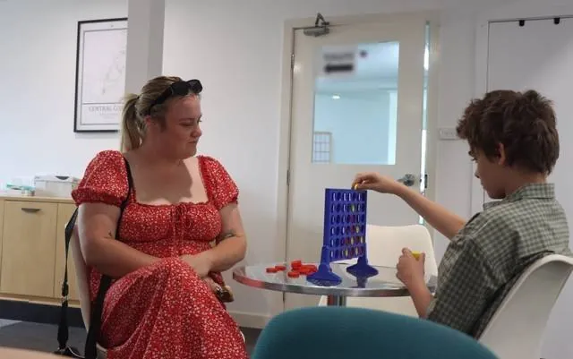 Friends playing a game of Connect Four together